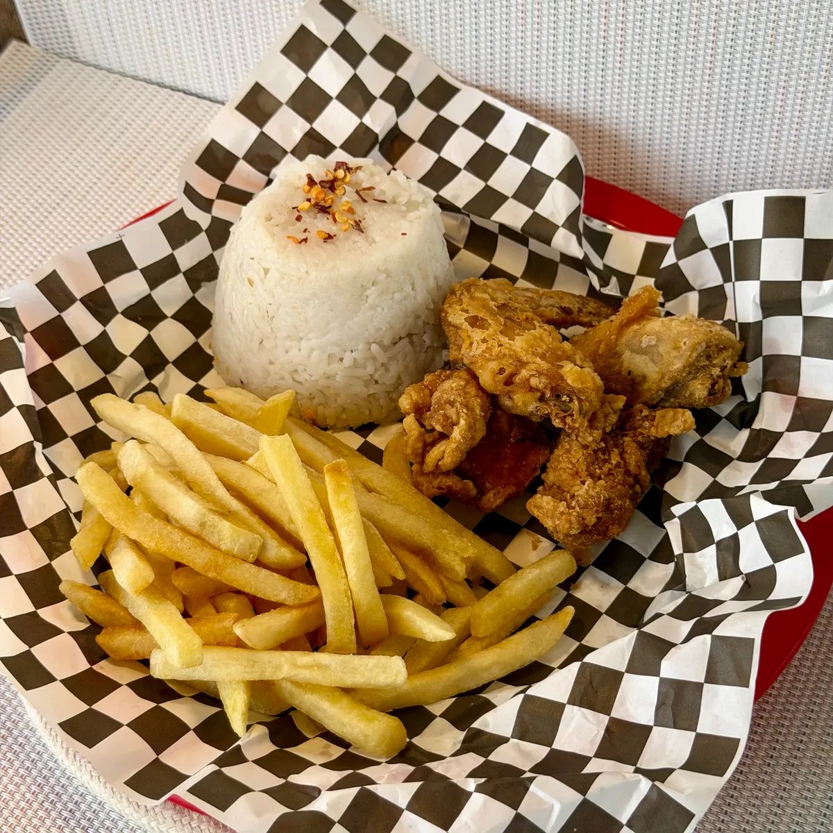 NamNam Supermeal - fried chicken, seasoned rice, and fries in a checkered basket